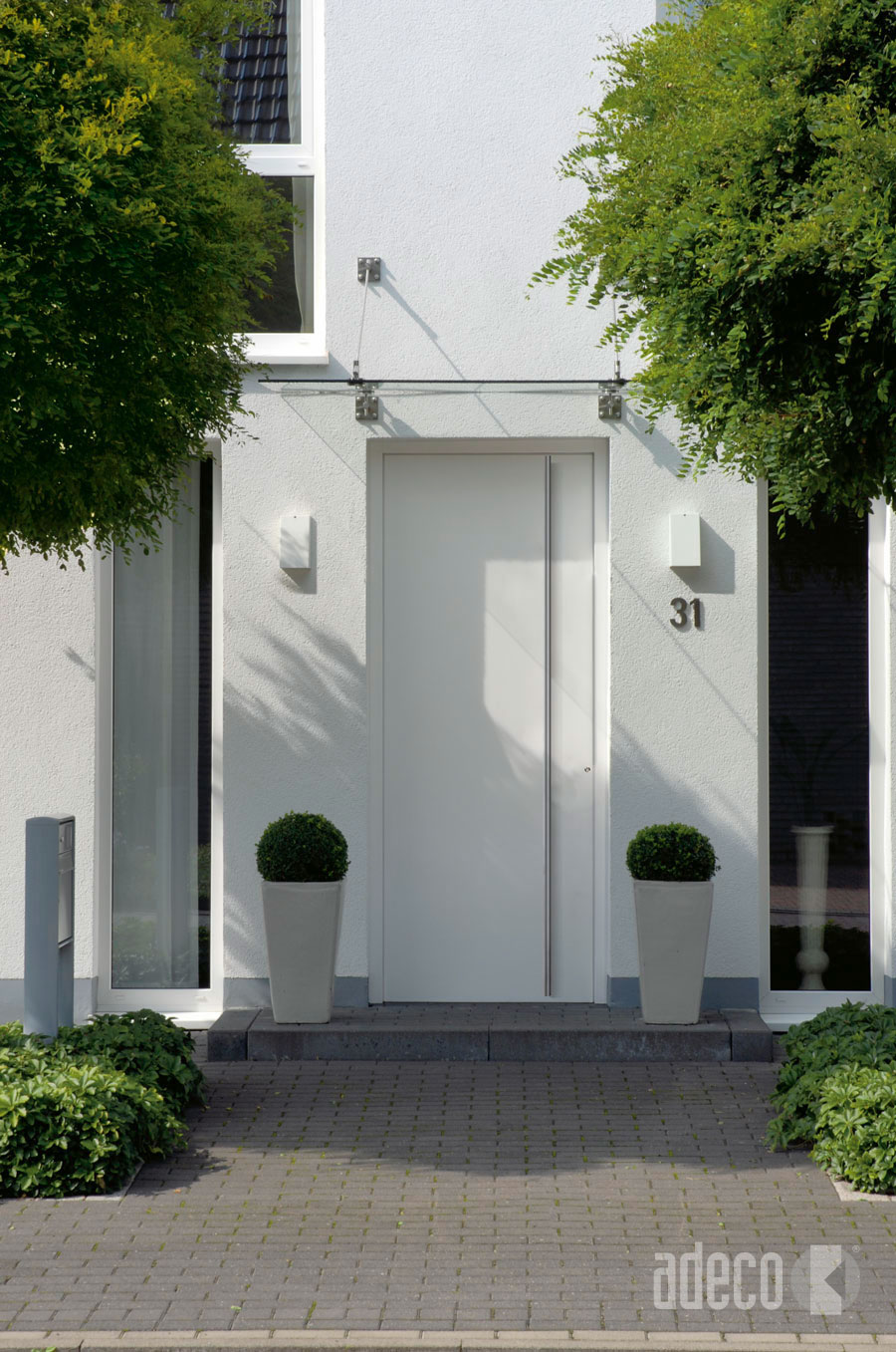 Adeco 100 tueren weisse hausfassaden Vilmo Objekt2 A 2013